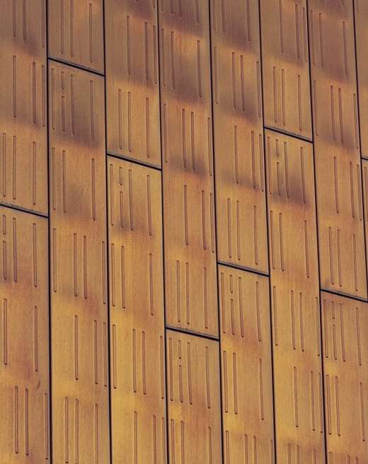 Facade of copper-toned metal panels